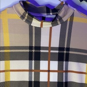 A midi warm color dress.